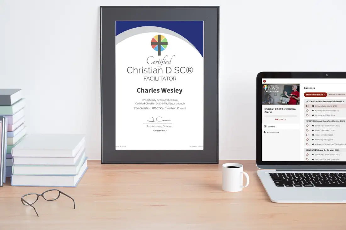 A framed certified christian disc® facilitator certificate in a sleek black frame, featuring a blue and white design with a colorful circular logo at the top.